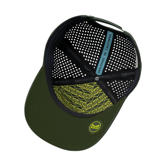 Green flat-brim cap with black perforated crown, yellow geometric underbrim pattern, and blue "DESIGNED IN CALIFORNIA" tag