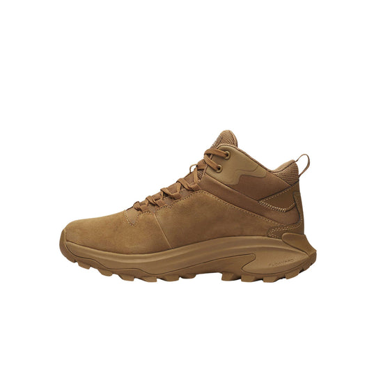 Tan mid-height tactical hiking boot with mesh panels, lace-up closure, and rugged lug sole