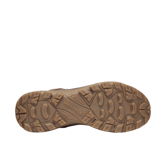 Tan hiking boot outsole with rugged tread and Merrell branding