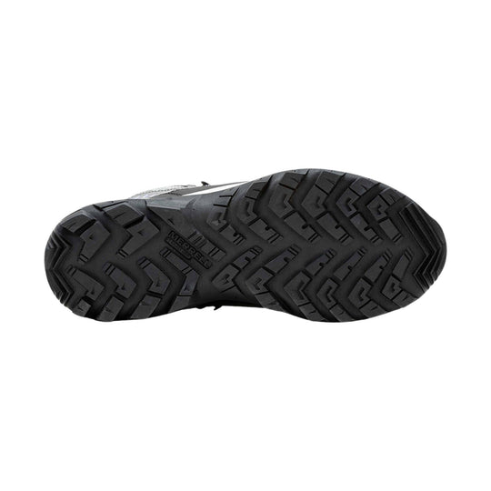 Black boot outsole with aggressive tread pattern