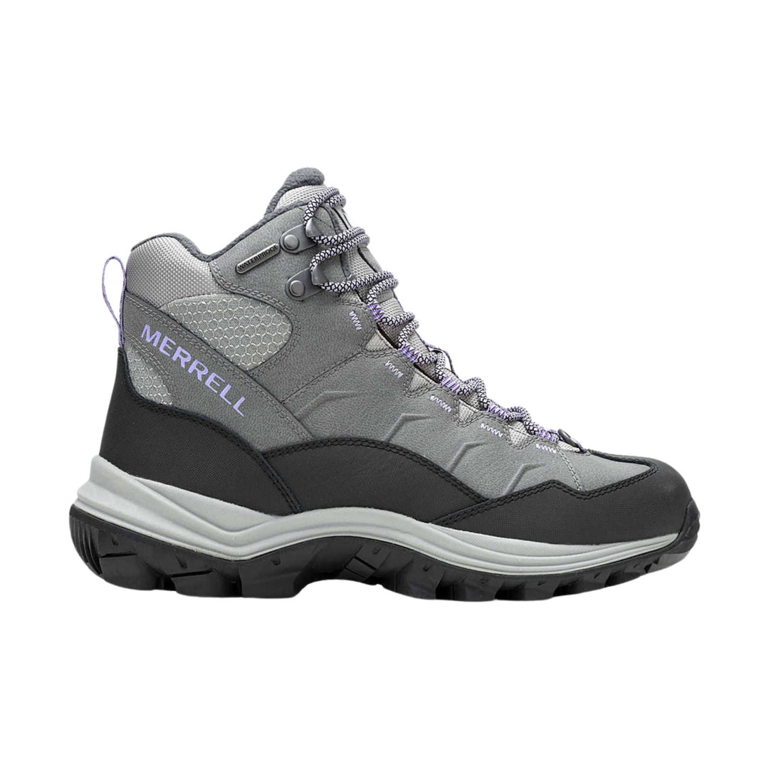 Gray mid-height hiking boot with black sole, purple laces, and side branding
