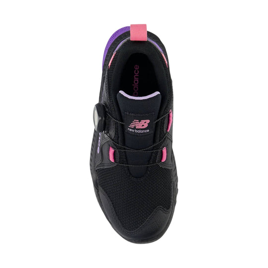 Black kids' sneaker with pink and purple accents, BOA dial closure, and visible New Balance branding