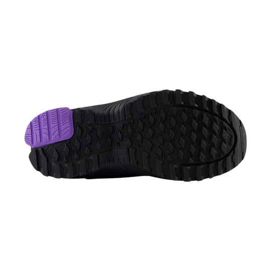 Black trail shoe outsole with a purple heel insert and deep lug tread