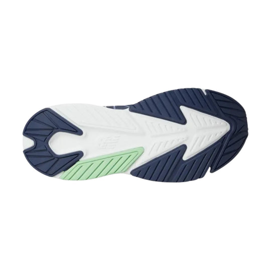 Navy and white sneaker outsole with green accent panel