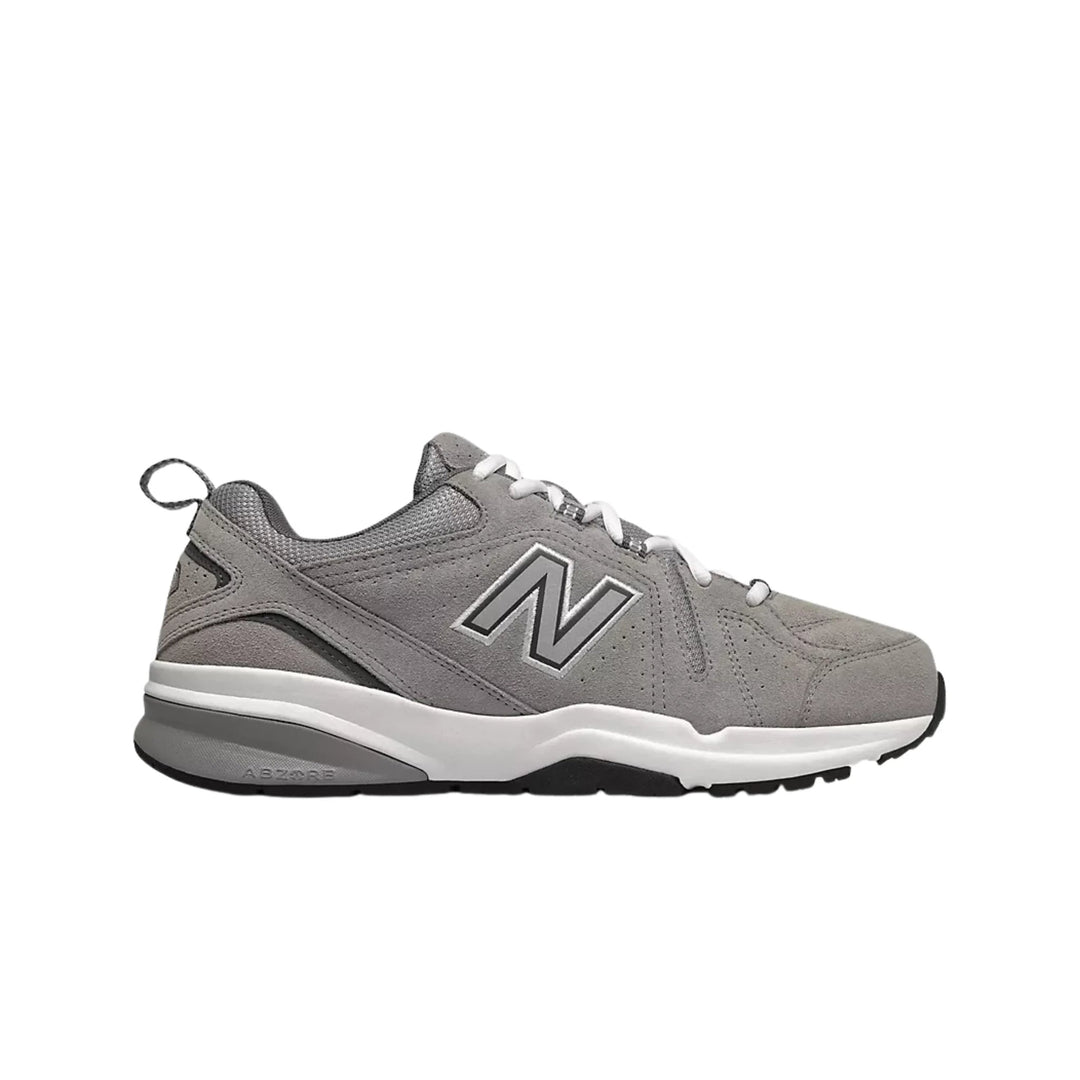 Gray athletic training shoe with white laces and black sole