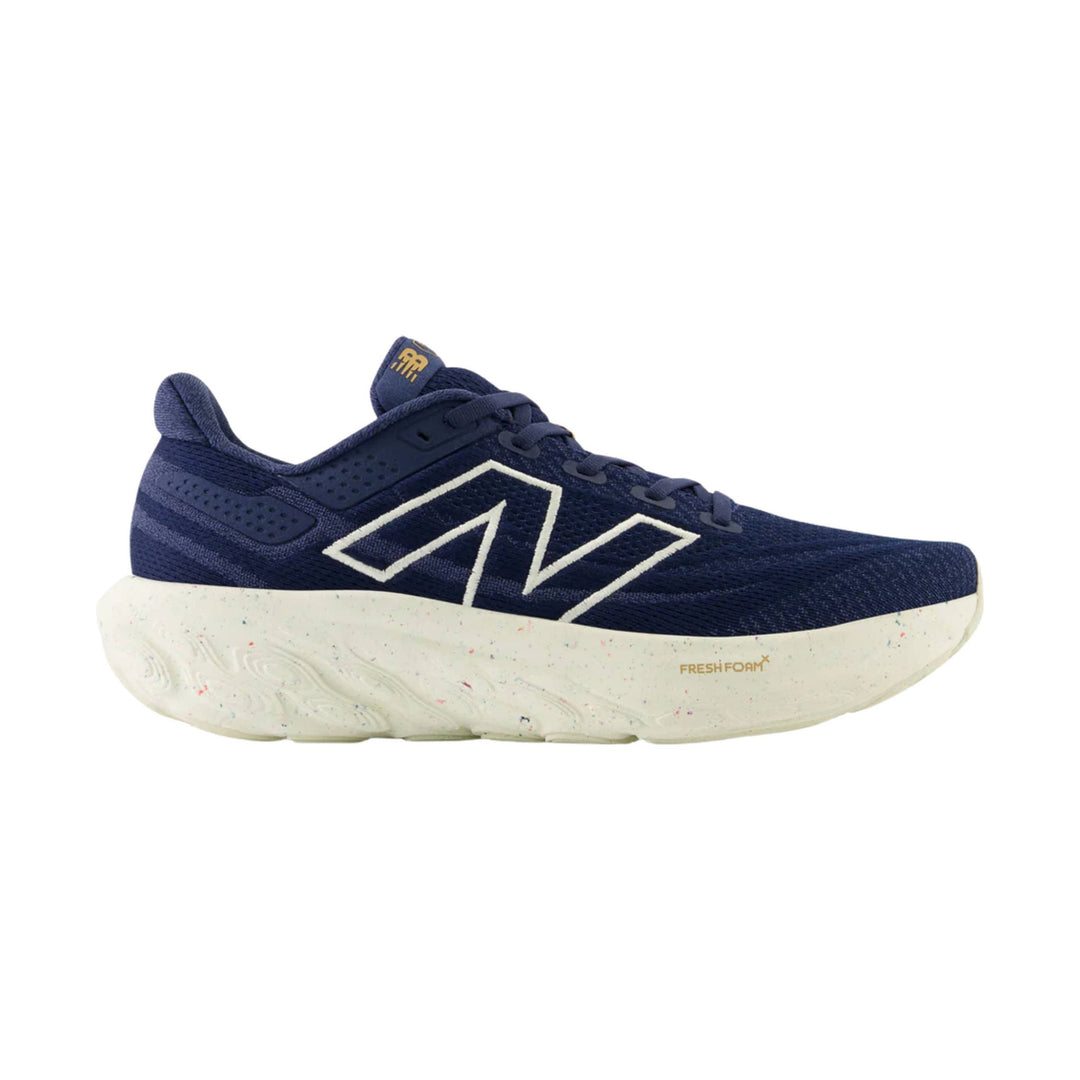 Navy running shoe with white logo outline, knit upper, and thick speckled foam sole