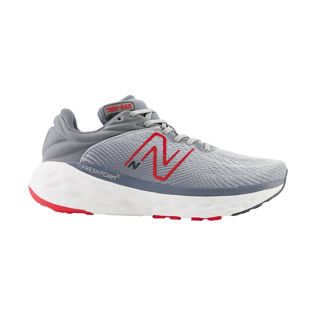 Gray running shoe with red logo, white midsole, and visible Fresh Foam X 840 branding