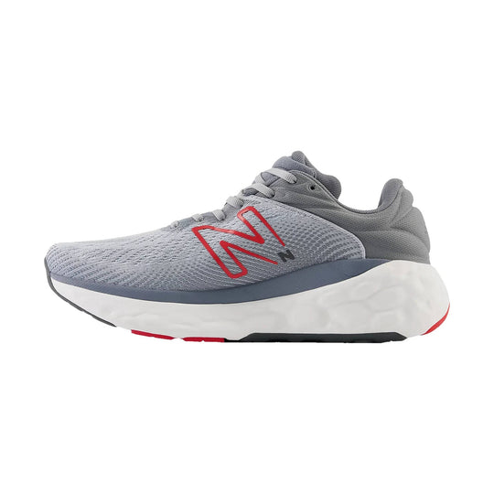 Gray running shoe with knit upper, red side logo, and thick white foam sole