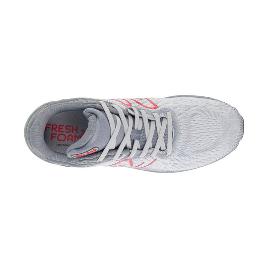 Light gray running shoe with white laces and red logo accents, top view
