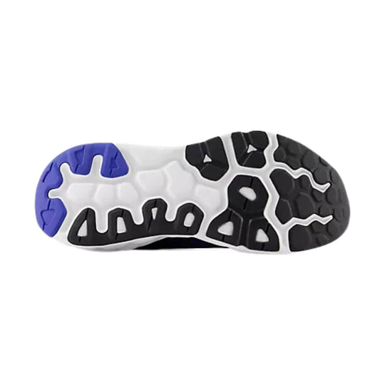 Outsole of a running shoe with white foam, black rubber traction pods, and a blue heel section