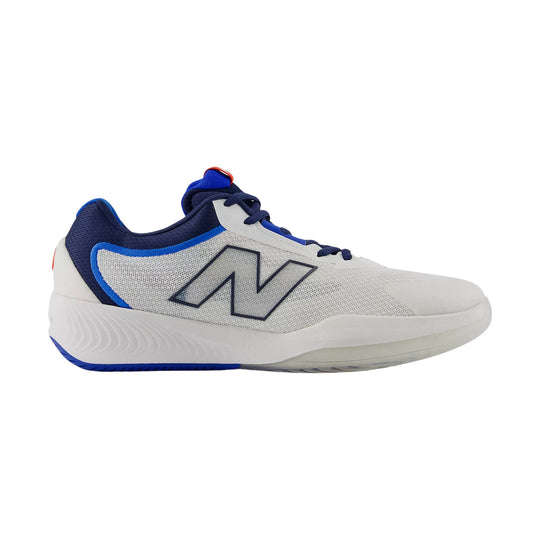 White low-top athletic shoe with navy and blue accents and a large side logo