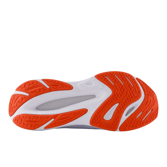 Orange and white shoe outsole with patterned tread and gray cutouts