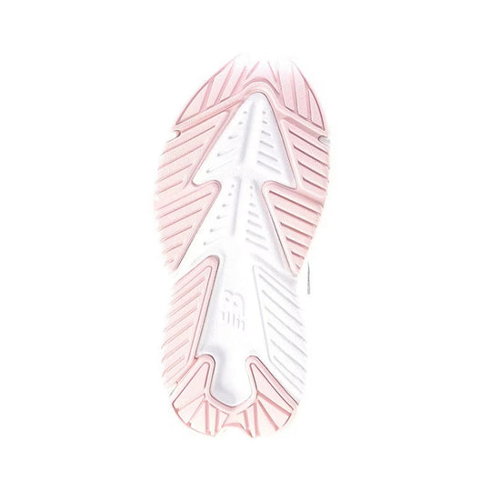 White shoe outsole with pink tread accents and a central arrow-shaped traction pattern