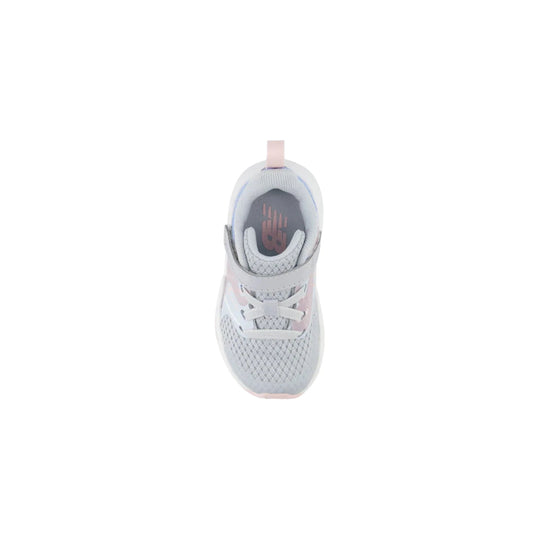 White toddler sneaker with bungee laces, a top strap, and pink and blue accents, shown from above