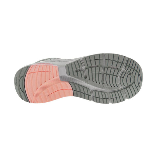 Gray athletic shoe outsole with pink heel cushioning and deep tread pattern