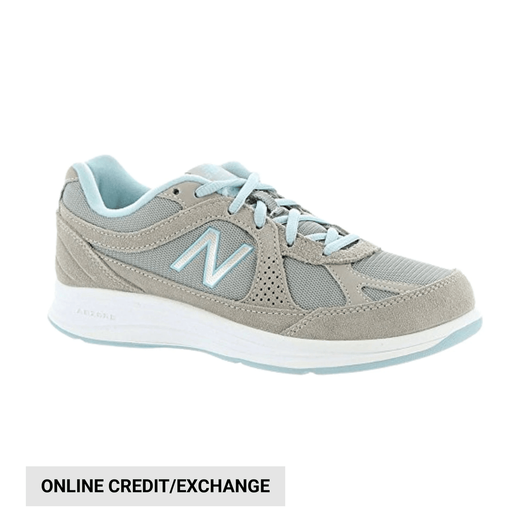 Light gray walking shoe with pale blue laces and trim, shown in side view