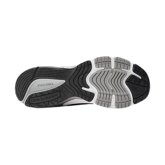 Black and gray running shoe outsole with wavy tread and visible cushioning panels