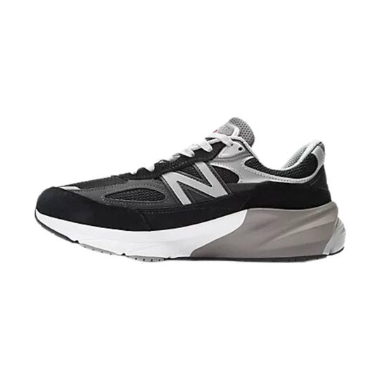 Black, gray, and white running shoe with a large side logo and thick cushioned sole