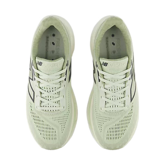Pair of pale green running shoes shown from above with mesh uppers, white laces, and visible NB logos