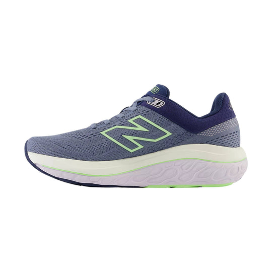 Blue-gray running shoe with lime green logo, white midsole, and navy collar, shown in side view