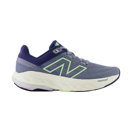 Gray and navy running shoe with lime green side logo, thick white sole, and visible Fresh Foam branding