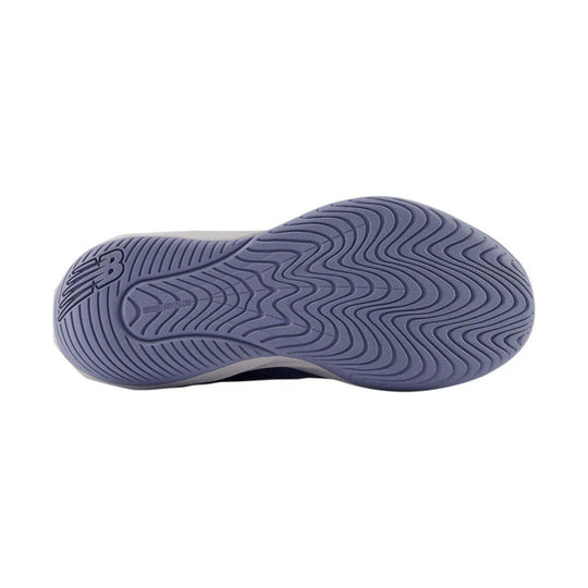 Purple rubber shoe outsole with wavy tread pattern and New Balance logo