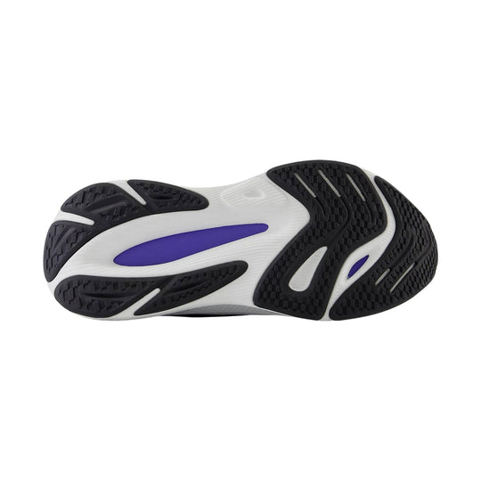 Black and white sneaker outsole with purple inserts and textured rubber tread