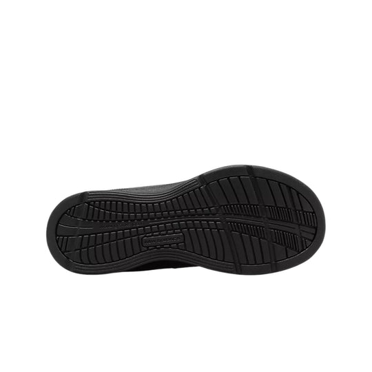Black sneaker outsole with New Balance logo and tread pattern