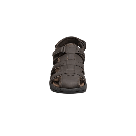 Brown closed-toe sandal with wide leather straps and a buckled ankle strap