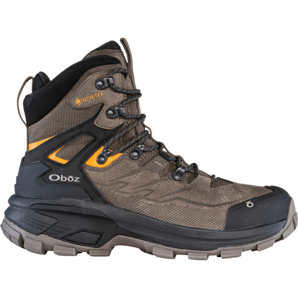 Brown and black mid-height hiking boot with rugged sole and GORE-TEX branding