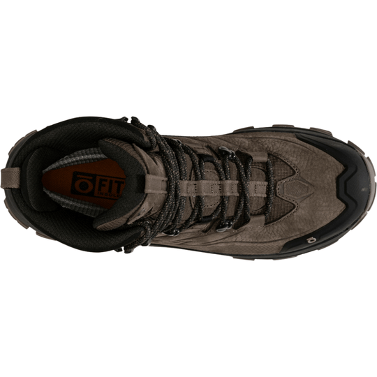 Brown mid-top hiking boot with black toe cap, bungee laces, and padded collar