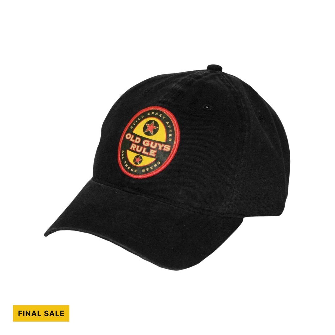 Black baseball cap with a round red-and-yellow patch and a FINAL SALE tag