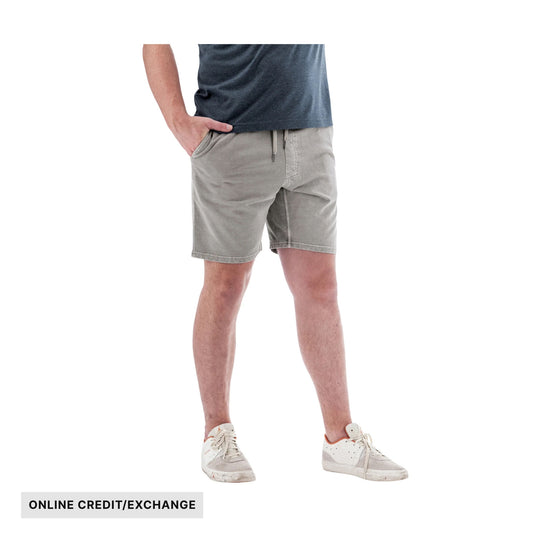 Light gray pull-on knit shorts worn with a dark T-shirt and white sneakers, with "ONLINE CREDIT/EXCHANGE" text