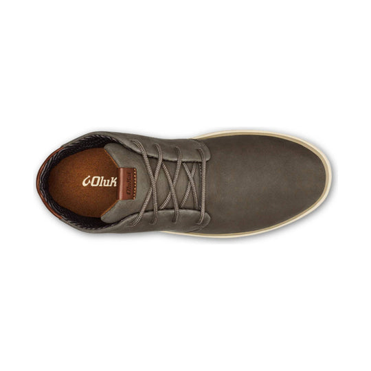Brown lace-up boot top view with a cushioned tan insole and visible Olukai branding