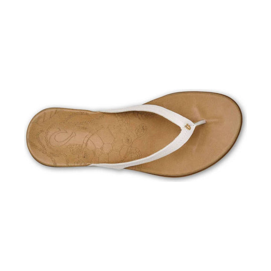 White thong sandal with tan footbed and gold toe post detail, shown from above