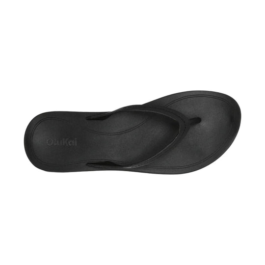 Black thong sandal with a contoured footbed and visible OluKai logo