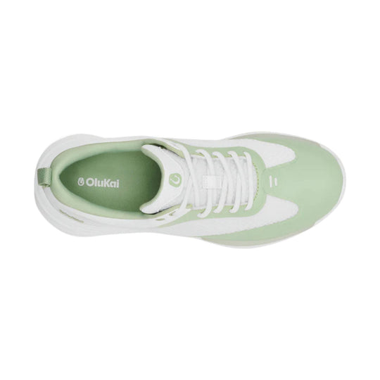 White and mint golf shoe with white laces and a thick sole, viewed from above
