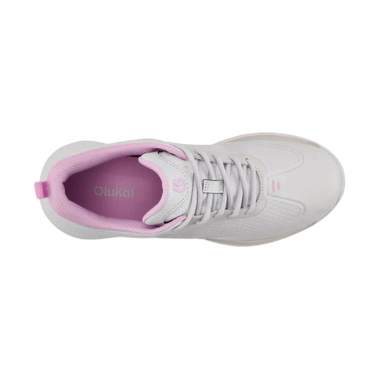 White golf shoe with pink lining, laces, and heel tab, shown from above