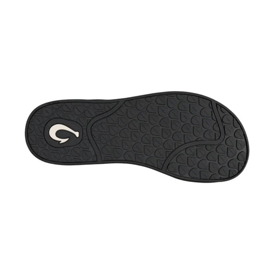 Black rubber sandal outsole with patterned tread and logo insert