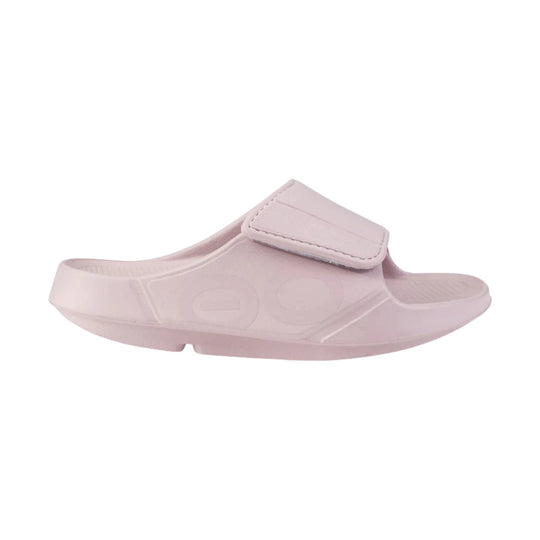 Light pink slide sandal with a wide top strap and contoured footbed