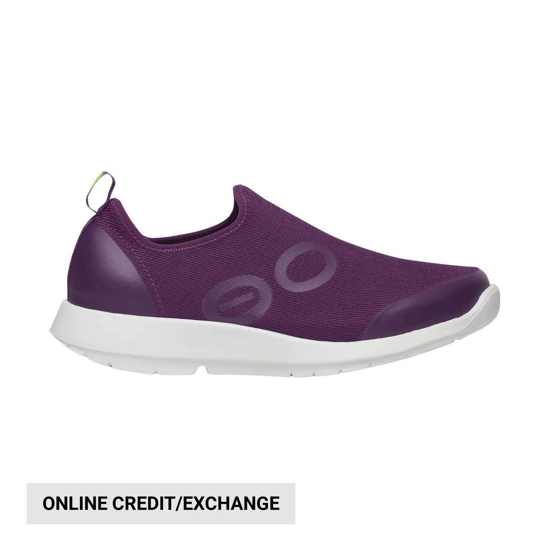 Purple slip-on knit sneaker with white sole and heel pull tab