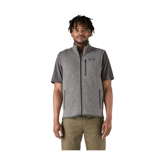 Gray heathered fleece vest with full-zip front and chest logo, worn over a dark short-sleeve shirt