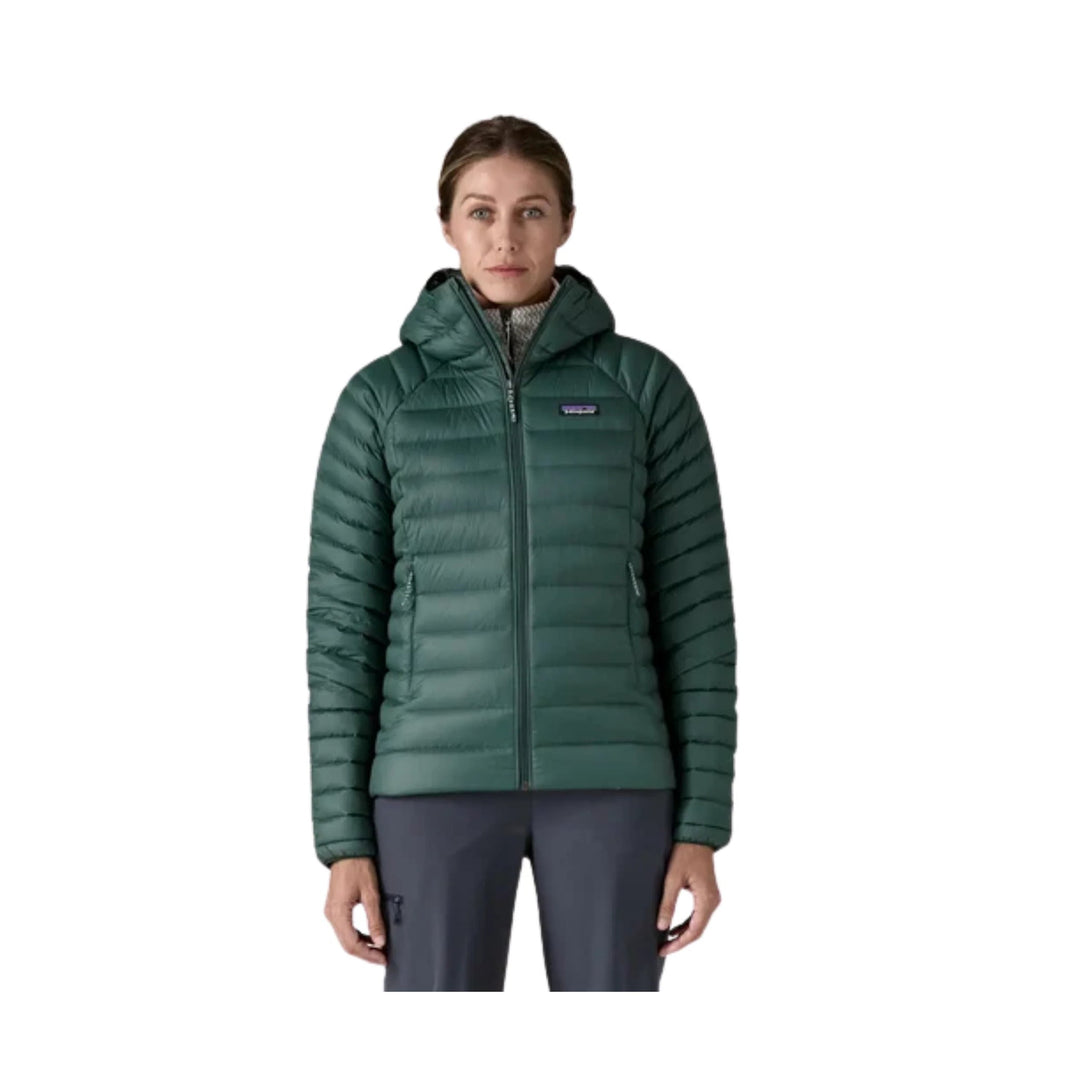 Dark green hooded puffer jacket with full-length front zipper and chest logo patch