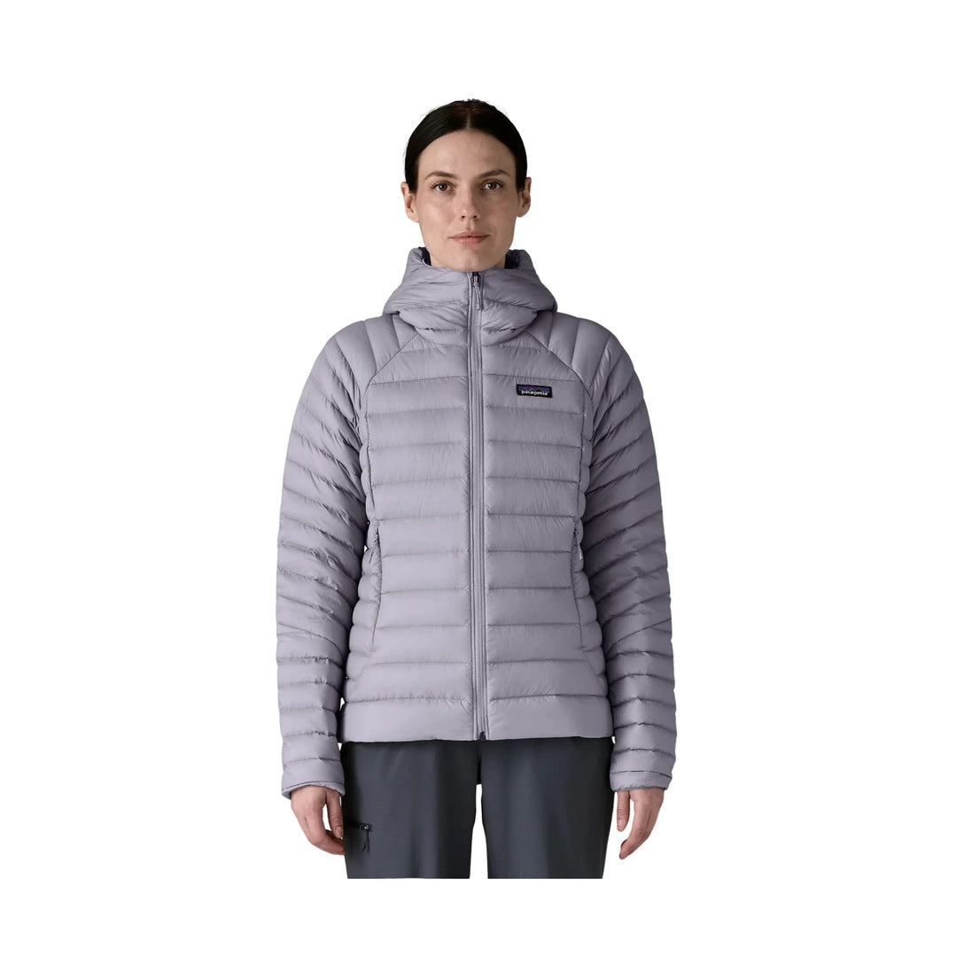 Light gray hooded puffer jacket with front zipper and Patagonia chest logo