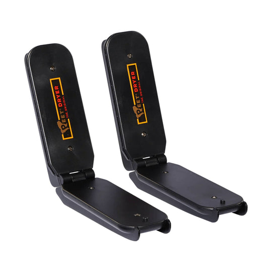 Pair of black folding electric shoe dryers with orange and red branding