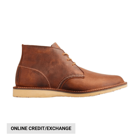 Brown leather ankle chukka boot with tan sole, shown in side profile