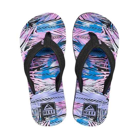 Pair of kids' flip flops with black straps and a pink, blue, and purple tropical palm frond print