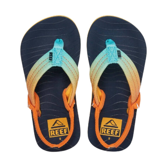 Pair of navy flip-flops with orange straps and blue toe posts, showing REEF logos on the insoles