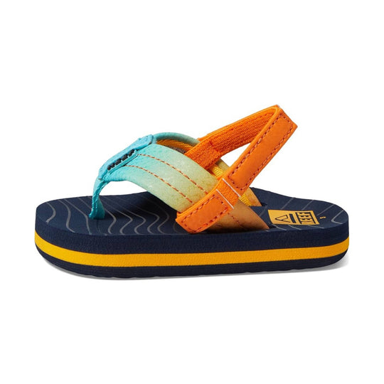 Colorful toddler flip-flop with teal and orange straps on a navy sole
