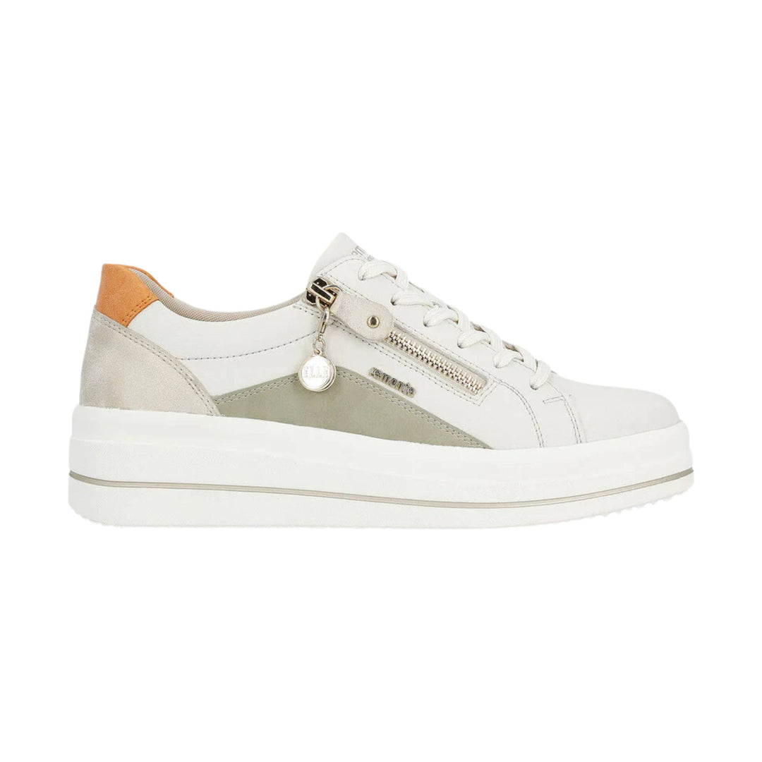 White low-top platform sneaker with side zipper, lace-up front, and orange heel accent